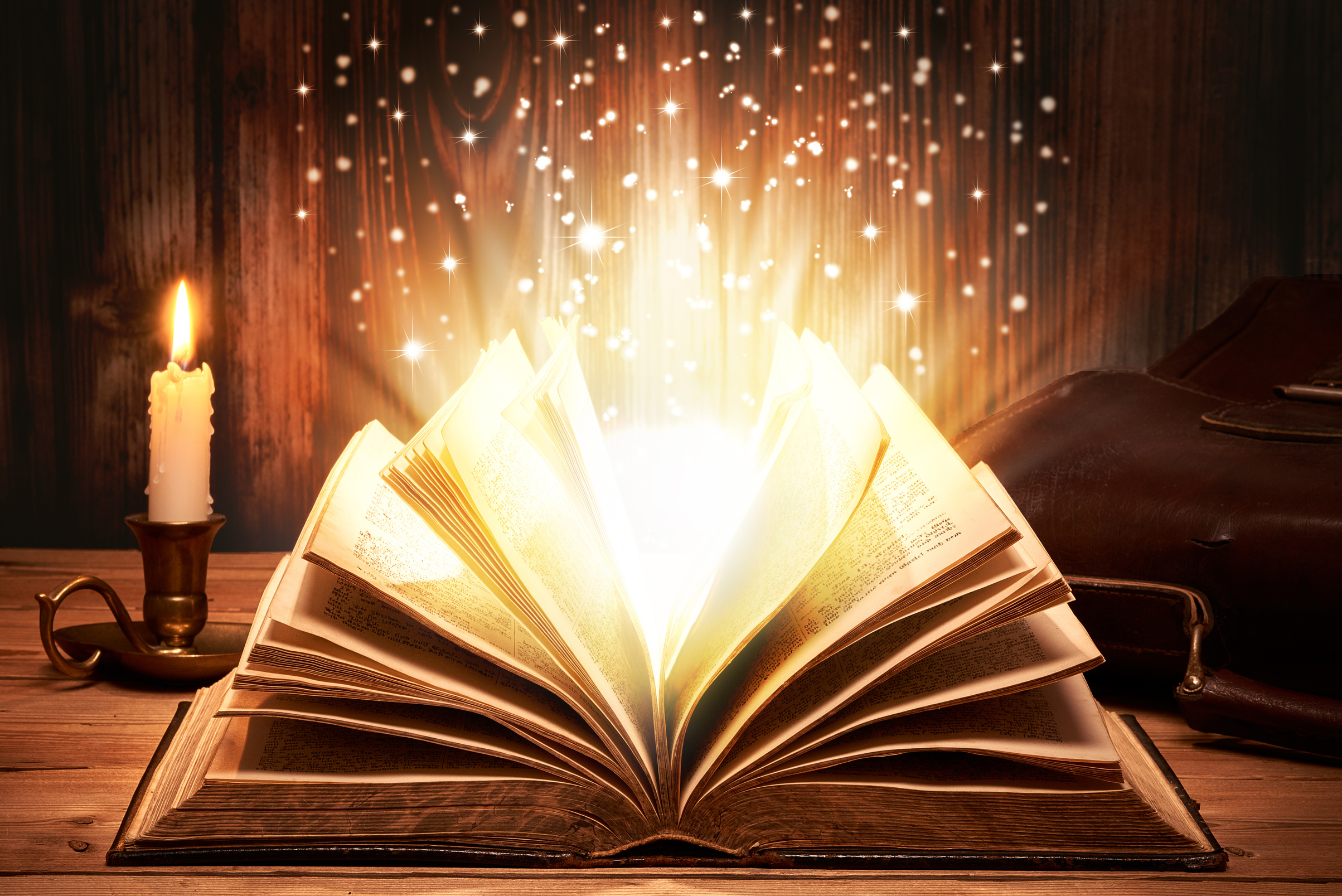 Magical old book with sparkles